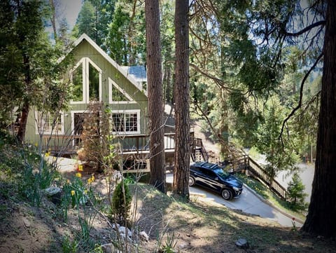 View of house from lookout point on hillside.