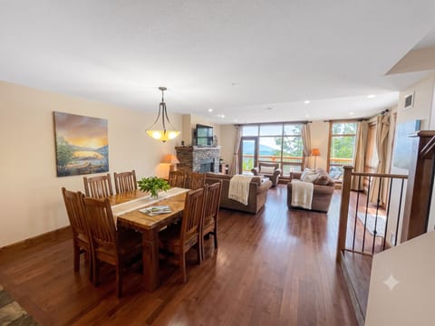 Open plan living at its best. Full kitchen, dining area and cozy living area. Gas fireplace, smart TV and access to a huge deck with a gas BBQ and lots of seating.