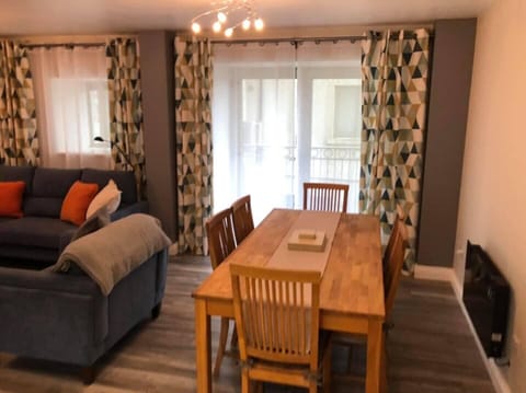 Oak Dining Table looking out to the courtyard balcony.