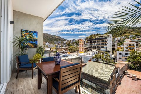 Private Balcony — Start your day with coffee and sweeping views