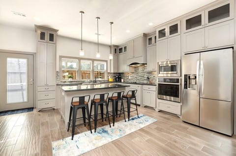 Whip up tasty meals in our fully equipped kitchen, complete with luxury finishes and top-of-the-line appliances.