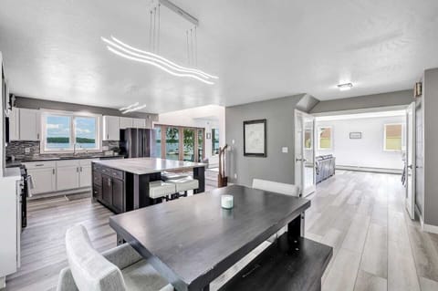View from corner of dining room facing kitchen and into living room