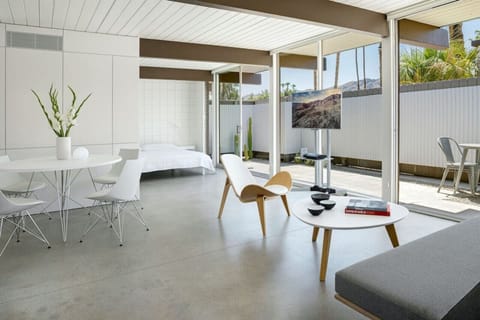Open floor plan featuring dining area, living room, and studio bedroom.