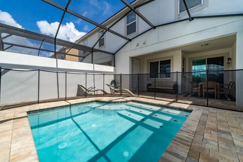 Splash pool with baby safety fence in place