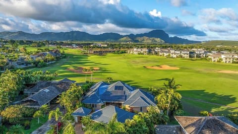 The view from above the home looking out at the Kiahuna Golf Course