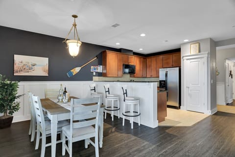 Dining room seats 9 using the breakfast bar.