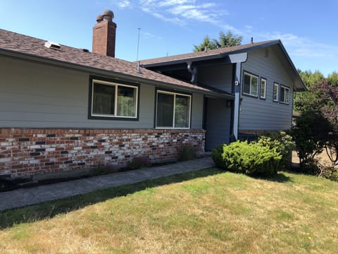 All new siding and windows and a fresh coat of paint makes the house stand out!
