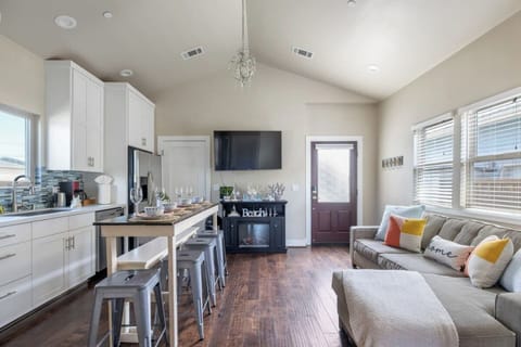 The living, dining, and kitchen area.