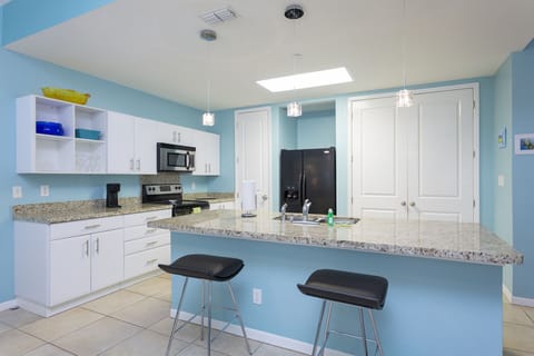 Kitchen Area provides extra counter space seating