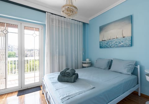 Apartment, 2 Bedrooms, Balcony, Sea View | Laptop workspace, soundproofing, iron/ironing board, cribs/infant beds