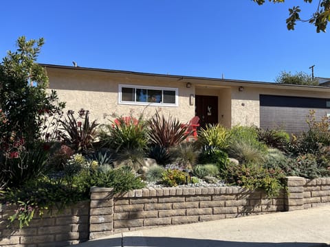 4 bedroom  home with large backyard, deck, front patio and spa soon early April 
