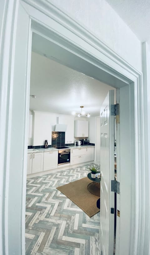 We have na lovely open plan kitchen, lounge, dining room 