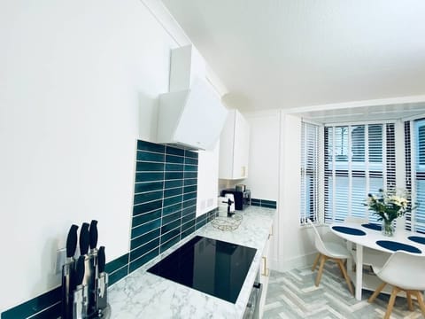 We have na lovely open plan kitchen, lounge, dining room 