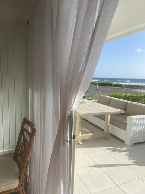 Veranda with gorgeous views & steps to beach.