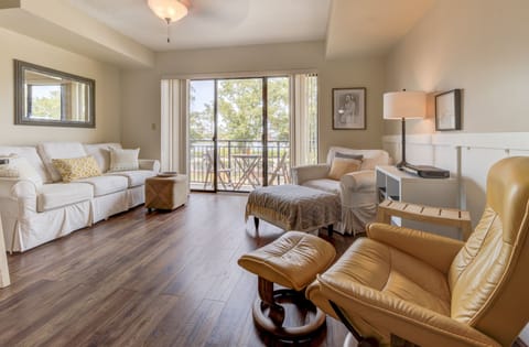 Main living room with Smart TV, & pull-out Queen couch. 