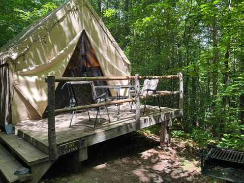 Hidden Ridge Glamping Tent Sleeps 3 Twin Bed & Full Bed all linens included.
