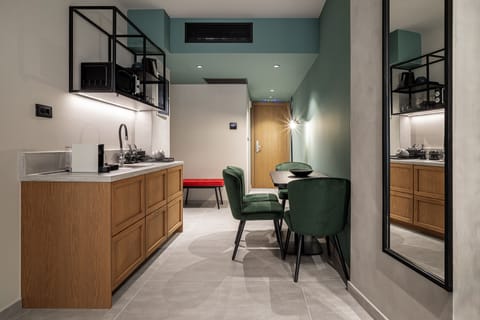 Deluxe Suite, 2 Bedrooms, Connecting Rooms | Private kitchen | Mini-fridge, microwave, espresso maker, coffee/tea maker