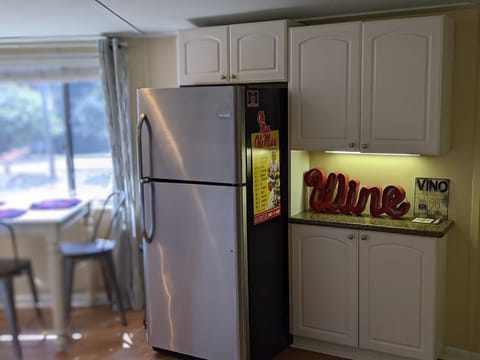 Dining & kitchen area with walk up bar to mix your favorite drinks!
