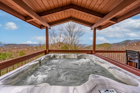 Relax in the hot tub after a day out on the town. The back porch also provides a nice view of the Dollywood fireworks show.