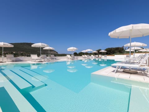 Water, Sky, Swimming Pool, Azure, Umbrella, Outdoor Furniture, Sunlounger, Shade, Building, Leisure