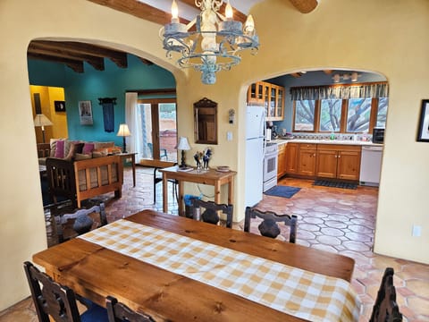 Dining area with view to kitchen and living room.