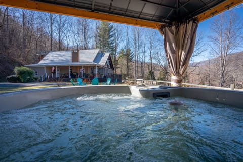 Enjoy the breathtaking mountain views as you soak your stress away.