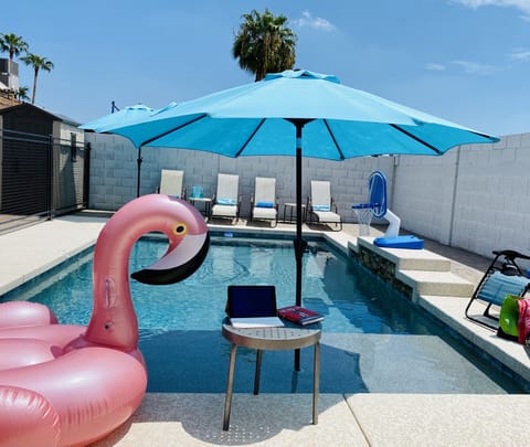Sit, play, or work on the fab Baja ledge of this pool.  A unique feature.
