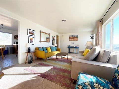 The upstairs kitchen is right behind the living room, making everything convenient and easy to access.
