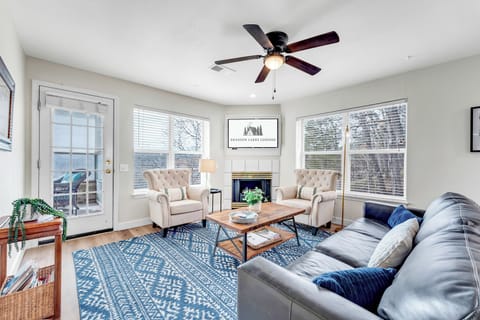 Enjoy the great light and comfortable living room in the condo. 