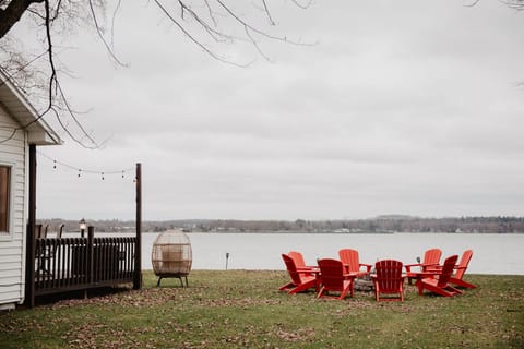 Front-row seats to the sunrise by day, glowing fire pit by night— all right on the lake.