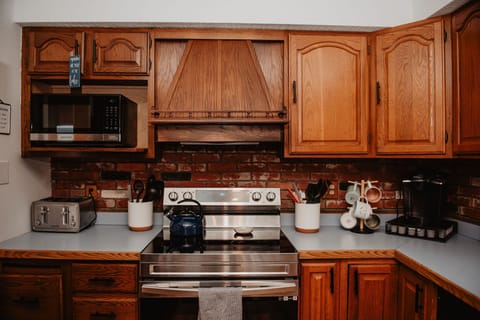 Thoughtfully designed and fully equipped, this kitchen makes it easy to enjoy meals at the lake.