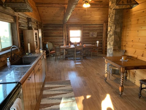 Very large kitchen with a dishwasher, microwave, stove/oven and refrigerator. 