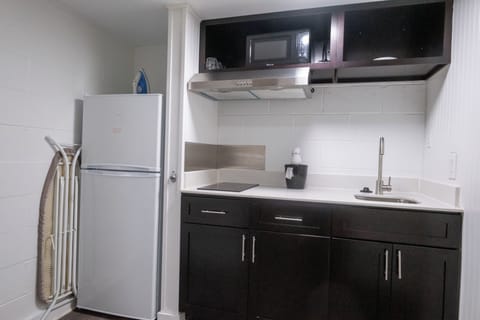 Fridge, microwave, coffee/tea maker, coffee grinder