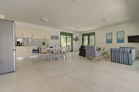 Family Villa | Living area | 40-inch Smart TV with satellite channels, TV