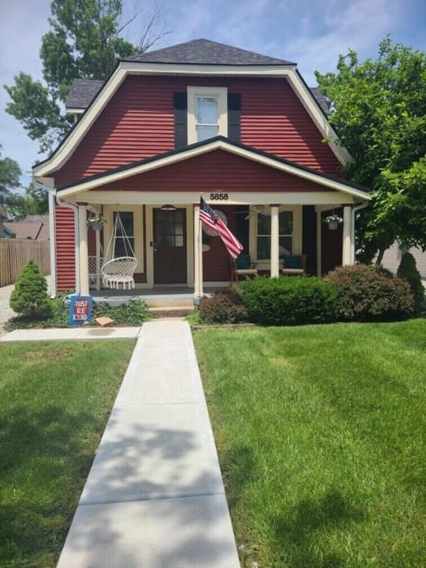 Large front porch with swings to enjoy the ambiance.