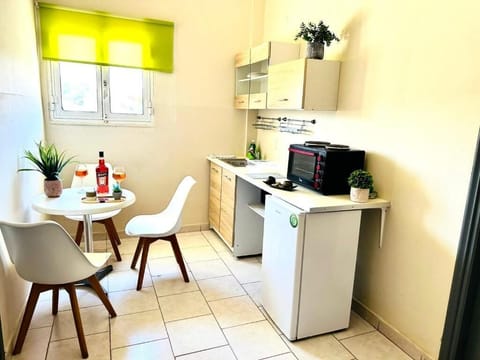 Mini-fridge, microwave, cookware/dishes/utensils