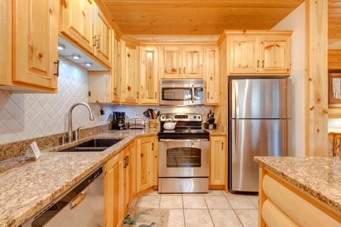 Your fully equipped kitchen includes stainless appliances, granite countertops, and everything needed for home-cooked meals.
