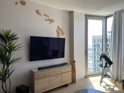 Smart TV, viewing telescope, automated curtains