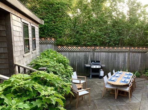 Private patio with gas grill.
