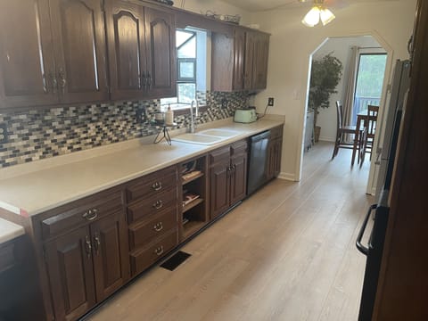 Kitchen also has toaster, blender, crock pot and many cooking utensils. 