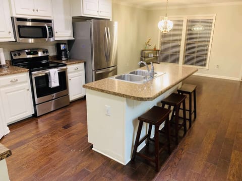 Kitchen Stocked with Cookware and Utensils