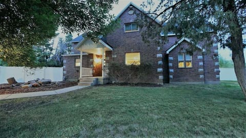 Front View of Historic Red Brick home, deer often relax under the window