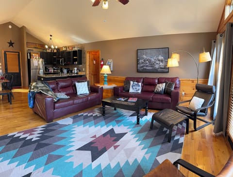 Great room includes living room, dining, and kitchen