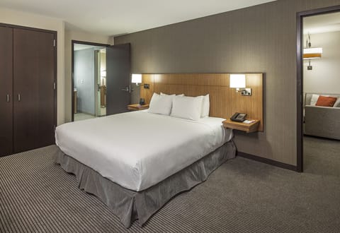 Suite, 1 King Bed, Accessible (Shower) | Hypo-allergenic bedding, desk, laptop workspace, blackout drapes
