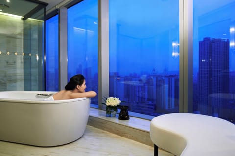Separate tub and shower, rainfall showerhead, designer toiletries