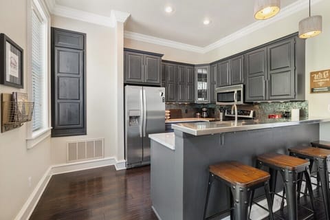 An open kitchen stocked with all necessary amenities for baking or cooking during your stay.