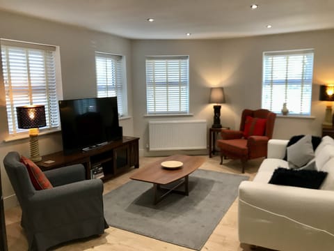 Plenty of comfortable seats and with a 55” smart tv!
