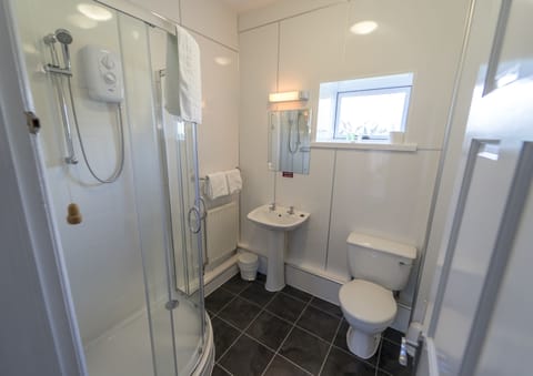 Shower, free toiletries, hair dryer, towels