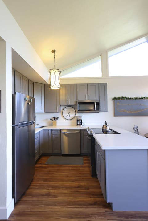 The newly remodeled kitchen as you enter the condo.