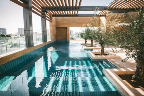 Outdoor pool, open 6:00 AM to 6:00 PM, pool umbrellas, sun loungers